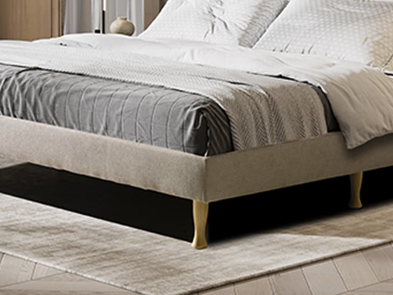 Bed bases and adjustable beds